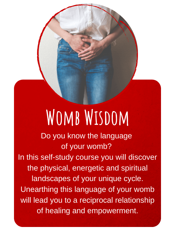 womb wisdom offering with white woman wearing blue jeans and a white shirt with hands placed over womb space